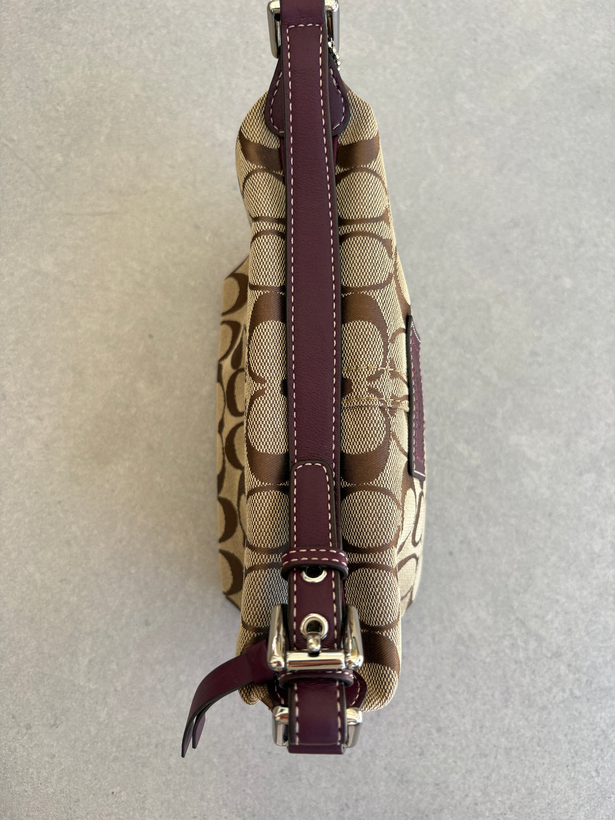 Coach Brown Monogram Signature Pouch with Purple Tag