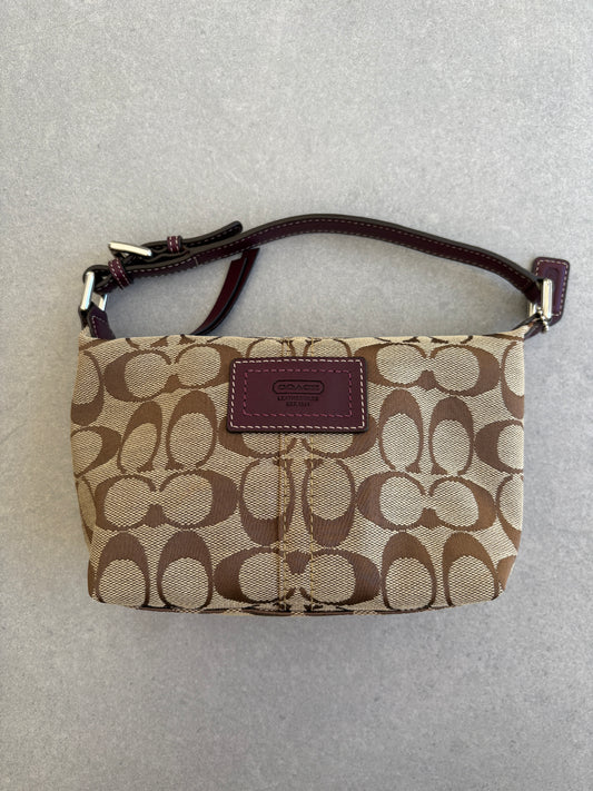 Coach Brown Monogram Signature Pouch with Purple Tag