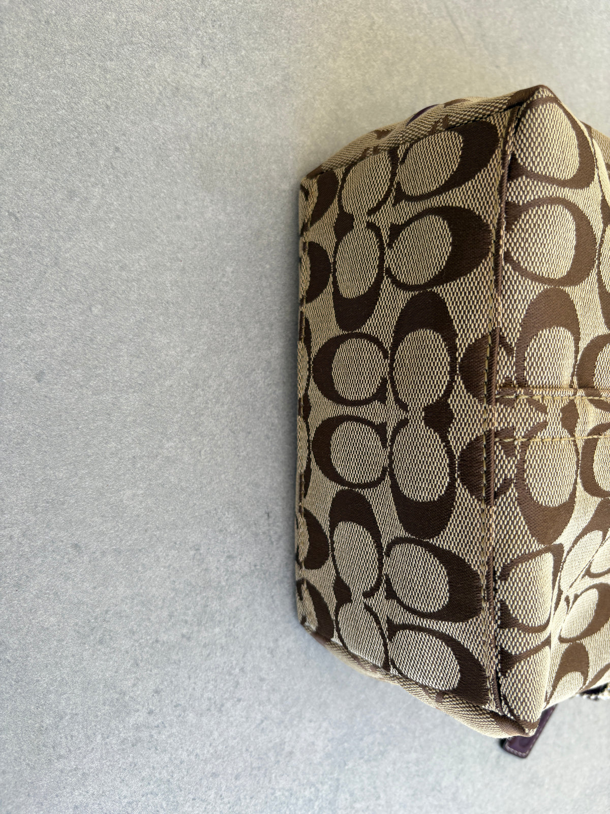 Coach Brown Monogram Signature Pouch with Purple Tag