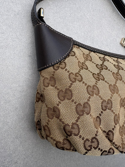 Gucci GG Canvas Pochette with Black Trim