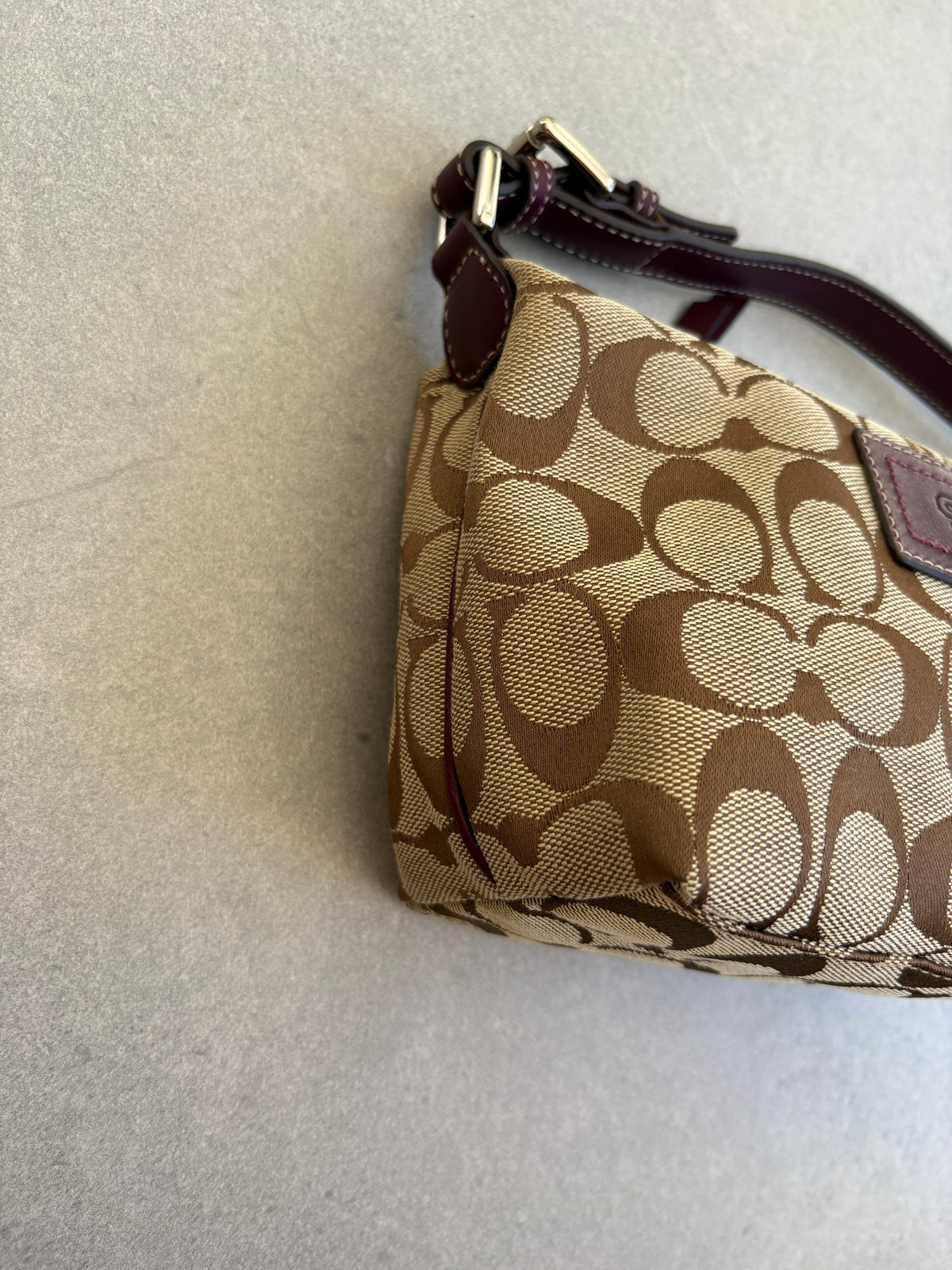 Coach Brown Monogram Signature Pouch with Purple Tag